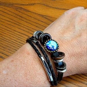 Leather bracelet or wrap. Unique. Unbranded. 8 inches. Snaps.